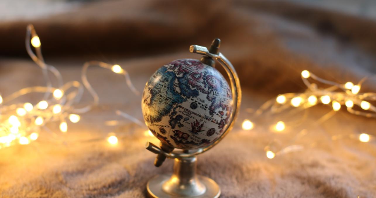 globe surrounded by fairy lights